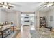 Spacious bedroom with an ensuite desk area and furnishings in a neutral palette at 3673 Fremantle Dr, Palm Harbor, FL 34684