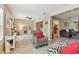 Inviting living room with wood-look floors, neutral paint, and abundant natural light at 3673 Fremantle Dr, Palm Harbor, FL 34684
