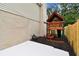 Side yard featuring playhouse with ladder, swing, and picnic table at 3673 Fremantle Dr, Palm Harbor, FL 34684