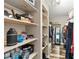 Spacious walk-in closet with built-in shelving provides plenty of storage space at 37331 Hickory Hill Ln, Dade City, FL 33525