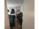 Guest bedroom with two beds, desk, and neutral decor at 4137 Lake Bayshore Dr # C505, Bradenton, FL 34205