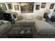 Living room with comfortable seating, stylish decor, and glass coffee table at 4137 Lake Bayshore Dr # C505, Bradenton, FL 34205