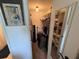 A walk-in closet features storage, hanging space, and a mirror at 4137 Lake Bayshore Dr # C505, Bradenton, FL 34205