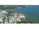 Stunning waterfront home with serene bay views, private dock, and lush green surroundings near the city at 4749 Baywood Point S Dr, Gulfport, FL 33711