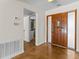 The front door leads to a welcoming foyer with modern finishes and sleek flooring at 4749 Baywood Point S Dr, Gulfport, FL 33711