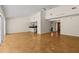 Spacious living room open to the kitchen, featuring access to the front entry at 4749 Baywood Point S Dr, Gulfport, FL 33711
