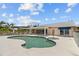 Beautiful home with a private pool and spacious patio, ideal for entertaining or relaxing outdoors at 4749 Baywood Point S Dr, Gulfport, FL 33711