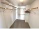 Walk-in closet with shelving and ample storage space at 4950 Gulf Blvd # 404, St Pete Beach, FL 33706