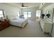 Bright main bedroom featuring ocean views, a ceiling fan, and a serene ambiance at 4950 Gulf Blvd # 404, St Pete Beach, FL 33706