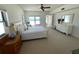 Spacious main bedroom with ocean view, neutral colors, and ample natural light at 4950 Gulf Blvd # 404, St Pete Beach, FL 33706