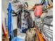 Organized closet with hangers, shelves, and storage for various items, providing practical space at 5005 Tangerine S Ave, Gulfport, FL 33707
