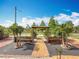 Inviting front yard featuring a charming brick walkway and lush landscaping under a clear blue sky at 5005 Tangerine S Ave, Gulfport, FL 33707