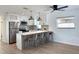 Modern, eat-in kitchen featuring stainless steel appliances, a breakfast bar, and pendant lighting at 5151 7Th N Ave, St Petersburg, FL 33710