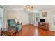 Comfortable living room features hardwood floors, natural light, and ample space at 5451 Antigua Dr, Zephyrhills, FL 33541