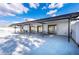 Covered patio with picnic tables, perfect for outdoor dining and relaxation at 5451 Antigua Dr, Zephyrhills, FL 33541