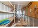 Unfinished basement space, perfect for workshop or storage at 5451 Antigua Dr, Zephyrhills, FL 33541