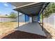Spacious covered patio and adjacent yard, perfect for relaxation and entertaining at 546 90Th N Ave, St Petersburg, FL 33702