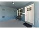 Entrance featuring a bench, front door, and decorative block walls at 546 90Th N Ave, St Petersburg, FL 33702