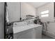 Functional laundry room with a modern washer and dryer set for easy chore completion at 546 90Th N Ave, St Petersburg, FL 33702