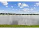 Serene lake view showcasing the beautiful community and tranquil surroundings at 6129 Marsh Trail Dr, Odessa, FL 33556