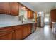Kitchen boasting new cabinets, countertops, stainless appliances, and marble floors at 624 La Jolla Ave, Sun City Center, FL 33573