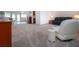 Spacious living room with neutral carpet, comfortable seating, and plenty of natural light at 624 La Jolla Ave, Sun City Center, FL 33573