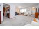 Open living room showcasing seamless flow between kitchen and relaxation areas at 624 La Jolla Ave, Sun City Center, FL 33573