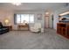 Inviting living room with neutral tones, comfortable seating, and plenty of natural light at 624 La Jolla Ave, Sun City Center, FL 33573