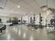 Bright gym with mirrors, free weights, and fitness equipment at 628 Cleveland St # 711, Clearwater, FL 33755