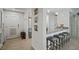 Bright living space featuring a modern kitchen with sleek countertops and stylish bar stool seating at 628 Cleveland St # 711, Clearwater, FL 33755