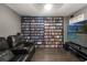 Home theater with comfortable seating, a large screen TV, and extensive movie collection at 6324 35Th Avenue E Cir, Palmetto, FL 34221