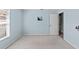 Bright bedroom with blue walls, a window, carpet and simple decor at 6324 35Th Avenue E Cir, Palmetto, FL 34221