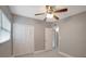 Bedroom with closet, window and ceiling fan at 6601 13Th N St, St Petersburg, FL 33702