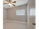 Bedroom with ceiling fan, large closet and window at 6601 13Th N St, St Petersburg, FL 33702