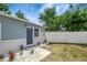 Close-up of the home's entrance and front garden with white stone at 6601 13Th N St, St Petersburg, FL 33702