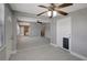 Spacious living room with tile floors and an open layout leading to the kitchen at 6601 13Th N St, St Petersburg, FL 33702