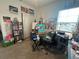 Bright bedroom with a window, art supplies, and lots of storage at 7563 Ashcroft Dr, Wesley Chapel, FL 33545