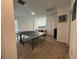 Recreational game room featuring a ping pong table and carpeted floors at 7563 Ashcroft Dr, Wesley Chapel, FL 33545