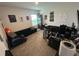 Versatile home office space with ample lighting, work space, and modern decor at 7563 Ashcroft Dr, Wesley Chapel, FL 33545