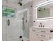 Contemporary bathroom with glass-enclosed shower, modern fixtures, and a stylish vanity at 7620 N 74Th St, Pinellas Park, FL 33781