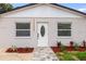 Charming home featuring a modern exterior, well-manicured landscaping, and a welcoming entrance at 7620 N 74Th St, Pinellas Park, FL 33781