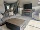 Inviting living area with tile flooring, neutral walls, and a cozy fireplace for relaxing evenings at 7800 125Th St, Seminole, FL 33772