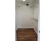 Walk in closet with wood floors and wire rack shelves at 8602 Huron Court # 47, Tampa, FL 33614