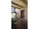 Condo entryway with unit number, stairway, and space for plants at 8602 Huron Court # 47, Tampa, FL 33614