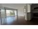 Open floor plan boasts living room, kitchen, and view to outdoor living at 8602 Huron Court # 47, Tampa, FL 33614