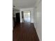 Open concept living space with sliding glass doors to balcony at 8602 Huron Court # 47, Tampa, FL 33614