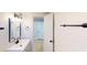 Tastefully designed bathroom with modern vanity, framed mirror, and matte black accents at 9218 Memorial Hwy, Tampa, FL 33615