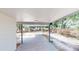 Covered carport area offering ample space and protection from the elements at 9218 Memorial Hwy, Tampa, FL 33615
