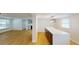 Kitchen with a large island, stainless steel appliances, and wood-look flooring at 9218 Memorial Hwy, Tampa, FL 33615