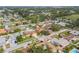 Aerial view of home with lush greenery, highlighting neighborhood and proximity to local amenities at 9309 120Th St, Seminole, FL 33772